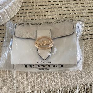 Beautiful brand new never used coach wallet and cardholder